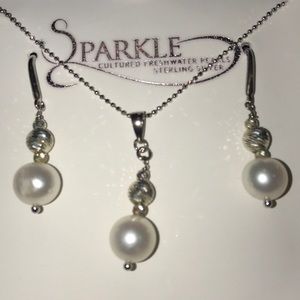 NWT in box. Fresh water pearl and earrings and pendant set sterling silv…